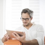 Mann mit Tablet - Winner